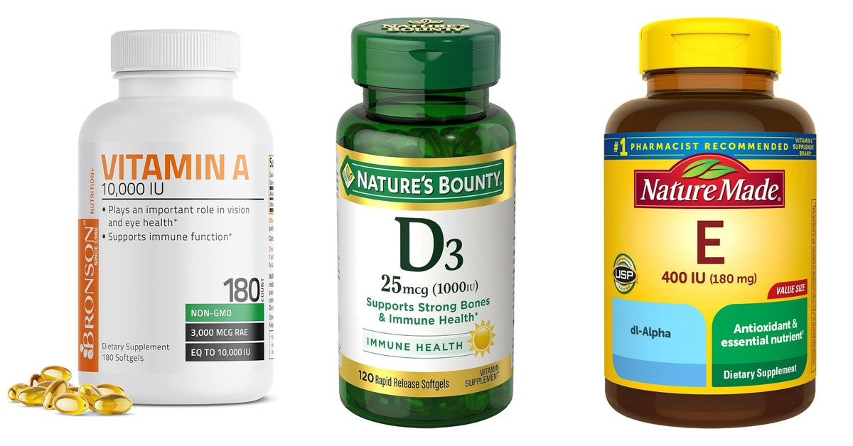 Three supplement bottles: Bronson Vitamin A 10,000 IU, Nature's Bounty D3 25 mcg and Nature Made Vitamin E 400 IU